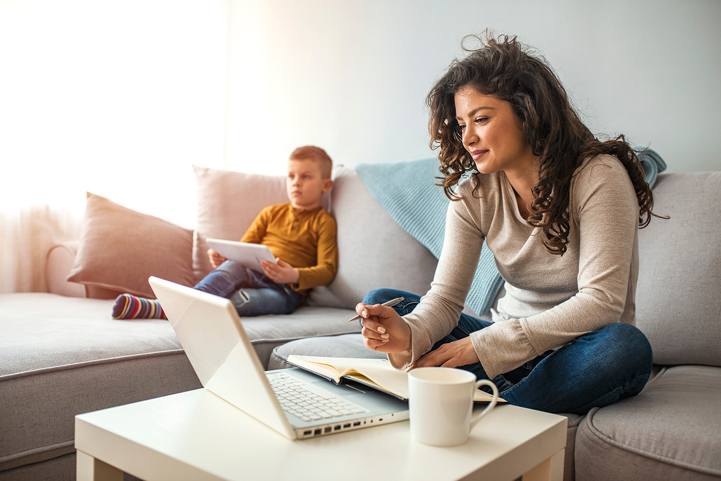 Mother with child working from home